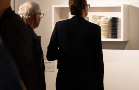 People in the Flora Twort Gallery looking at vessels