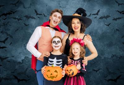 Family dressed in costume for halloween