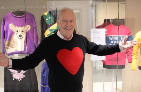 Gyles Brandreth standing in the Standfield gallery during his exhibition