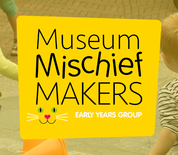 Kids running around the courtyard at Petersfield Museum and Art Gallery with bright yellow Mischief Maker logo