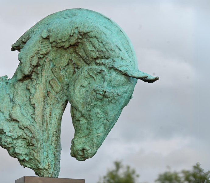 Bronze statue of a horse head.