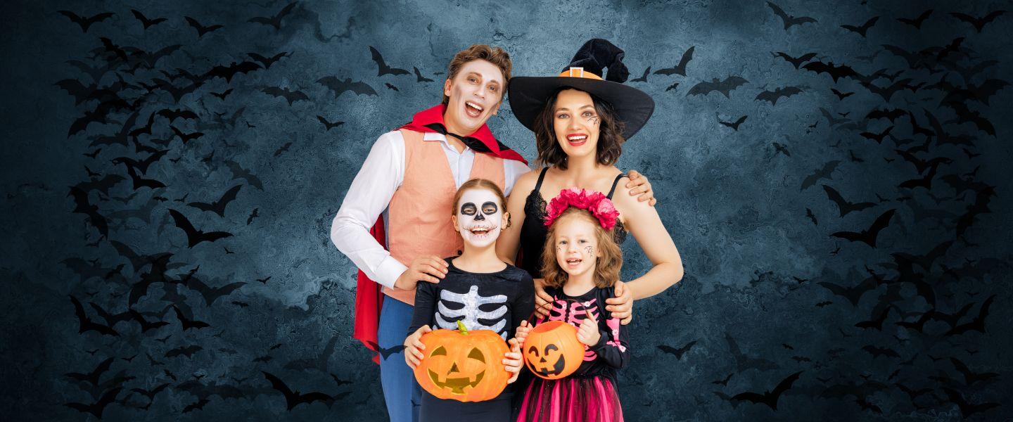 Family dressed in costume for halloween